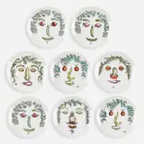 Arcimboldesca plates, set of eight by Piero Fornasetti, c. 1955, transfer-printed porcelain, sold Mar 2022