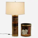 Libri table lamp and Libri paper basket by Piero Fornasetti, c. 1995, transfer-printed lacquered vellum, brass, linen, sold Mar 2022