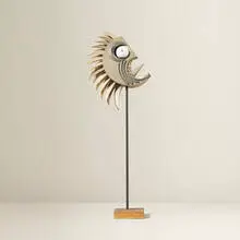 Untitled (Screaming Mask) by Irving Harper, wood and paper construction, sold Jan 2016