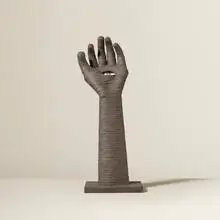 Untitled (Hand with Eye) by Irving Harper, painted paper construction with doll eye, sold Jan 2016