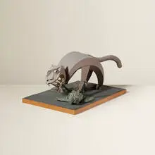 Untitled (Cat with Bird) by Irving Harper, painted paper construction on a wood base, sold Jan 2016