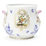 Meissen, PORCELAIN CACHE POT, gilded and polychrome enameled with shell handles and polychrome enameled cartouches of birds to either side, crossed swords mark, ht