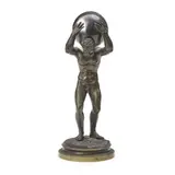 Bronze Atlas with Crystal Globe, 19th century,, dark brown patinated standing figure modeled supporting a glass ball atop his back,  ht