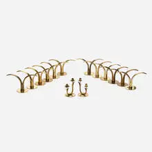 Ystad, Collection of fourteen candlesticks, c. 1950, brass