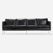 Sofa by Modern, c. 1960, chrome-plated steel, leather, sold Mar 2022
