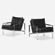 Lounge chairs, pair by Milo Baughman, c. 1975, chrome-plated steel, leather, sold Mar 2022