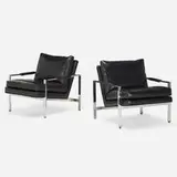 Lounge chairs, pair by Milo Baughman, c. 1975, chrome-plated steel, leather, sold Mar 2022