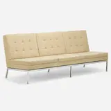 Sofa by Florence Knoll, c. 1955, chrome-plated steel, upholstery, sold Mar 2022