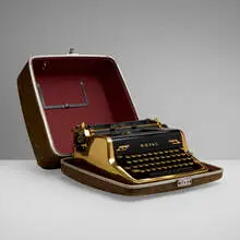 Royal Typewriter Co. Inc., Royal Quiet de Luxe portable typewriter (Gold), 1950, gold-plated and enameled metal, plastic