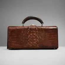 Doctor's bag by Antique, c. 1900, crocodile leather, plated brass, glass, cork, sold Nov 2024