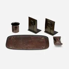 Roycroft, Collection of five tabletop accessories, c. 1920, handwrought copper