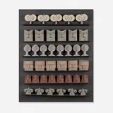 Untitled (Faces) by Irving Harper, painted paper construction with doll eyes and map pins, sold Jan 2016