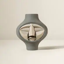 Irving Harper, Untitled (Face), painted ceramic and paper construction