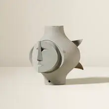 Irving Harper, Untitled (Face), painted ceramic and paper construction