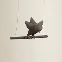 Untitled (Bird on Swing) by Irving Harper, painted paper, wire and wood construction, sold Jan 2016
