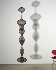 Ruth Asawa, Untitled S.437 (Hanging, Seven-Lobed, Two-Part Continuous Form within a Form with Two Small Spheres), 1956, Looped brass and steel wires