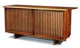 Double sliding door cabinet by George Nakashima, American black walnut, pandanus cloth, sold Feb 2014