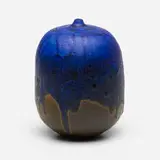Closed Form (with rattle) by Toshiko Takaezu, glazed porcelain, sold Mar 2022