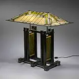 Frank Lloyd Wright, Robie House double-pedestal table lamp, c. 1985, patinated brass, leaded glass