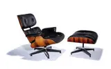 Charles and Ray Eames, Lounge chair and ottoman (2), Laminated rosewood, black leather upholstery, polished and enameled aluminum