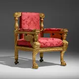 Morel & attribution Hughes, Regency Classical Revival throne chair, c. 1825, carved and gilt wood, upholstery, nickel-plated brass, casters