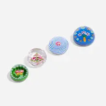 Perthshire Paperweights, Collection of four botanical paperweights, 1984-1994, millefiori, glass