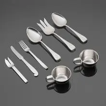 Porter Blanchard, Collection of eight tabletop accessories