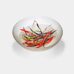 Untitled by Paolo Venini, the corroso bowl internally decorated in lattimo, with a series of loose decorative murrine and doppio incalmo glass can, sold Aug 2024