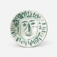Full-face Face by Pablo Picasso, 1960, white earthenware clay, engraving accentuated with oxidized paraffin, glaze, black enamel, sold Sep 2015
