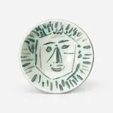Pablo Picasso, Full-face Face, 1960, white earthenware clay, engraving accentuated with oxidized paraffin, glaze, black enamel