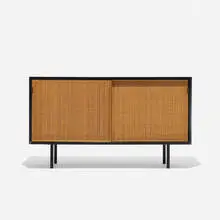 cabinet by Florence Knoll, 1948, lacquered wood, cane, enameled steel, leather, sold Sep 2015