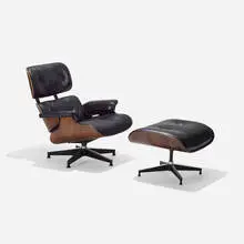 670 lounge chair and 671 ottoman by Charles and Ray Eames, walnut plywood, rosewood plywood, leather upholstery, enameled and brushed aluminum, sold Sep 2015