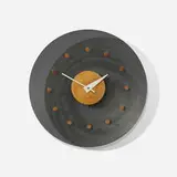 wall clock, model 2204B by George Nelson & Associates, 1952-53, perforated and enameled steel, birch, lacquered wood, enameled aluminum, sold Sep 2015