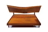 Platform bed and headboard by George Nakashima, c. 1960, American black walnut, sold Oct 2013