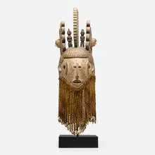 Igbo, White Maiden mask (Agbogho Mmuo), carved wood, pigment, fiber, shells