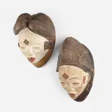 Punu artist, Mukudj masks, set of two, carved and painted wood