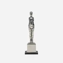 Ernest Trova, Standing Wrapman, 1986, stainless steel, acrylic