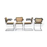 Marcel Breuer, Set of Four Cesca Dining Chairs, for Knoll, ebonized wood, caning, chromed steel, each stamped under metal arm 'KnollStudio Marcel Breuer'