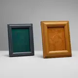 Jacques Adnet, Picture frames, set of two, c. 1950, saddle-stitched leather over wood, glass