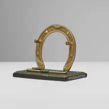 Horseshoe pen holder by Longchamp, sold Apr 2024