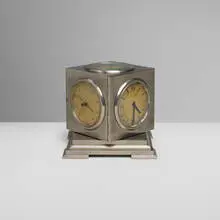 Compendium desk clock by Kirby Beard & Co., c. 1940, brushed and silver-plated brass, glass, sold Apr 2024