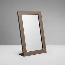 Hermès, Table mirror, c. 2000, leather, lacquered wood, mirrored glass