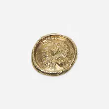 Bearded Man medallion by Pablo Picasso, 1949, 18 karat gold, sold Feb 2015