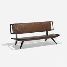 Paul Laszlo, settee, 1950, stained mahogany, cane