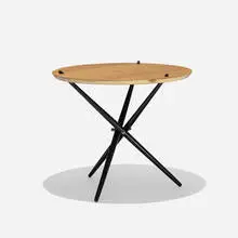 occasional table by Hans Bellmann, 1948, birch, lacquered wood, brass, sold Feb 2015