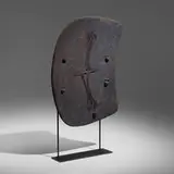 Papuan, Lumi shield, painted and carved wood, wicker, enameled steel
