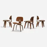Charles and Ray Eames, DCWs, set of four, 1945, walnut plywood, rubber