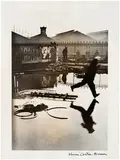 Behind the Gare Saint-Lazare by Henri Cartier-Bresson, Gelatin silver print, sold May 2013