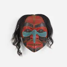 Untitled (Northwest Coast mask) by Chief Lelooska (Don Smith), carved and painted wood, horsehair, sold Feb 2024