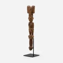 Female Shango staff by Yoruba, carved wood, enameled steel and brass, sold Oct 2023